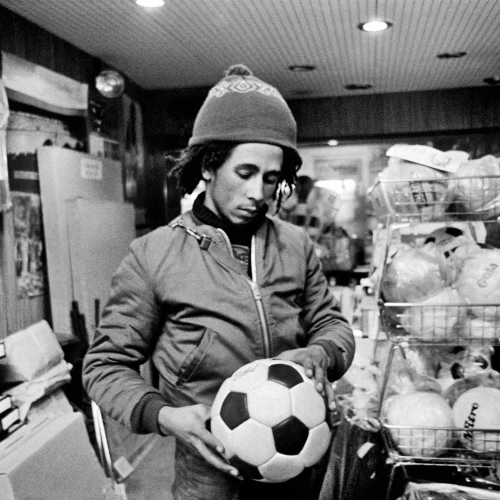 Dennis Morris - Bob Marley Shopping for the Trenchtown Kids, Leeds, UK 1974
