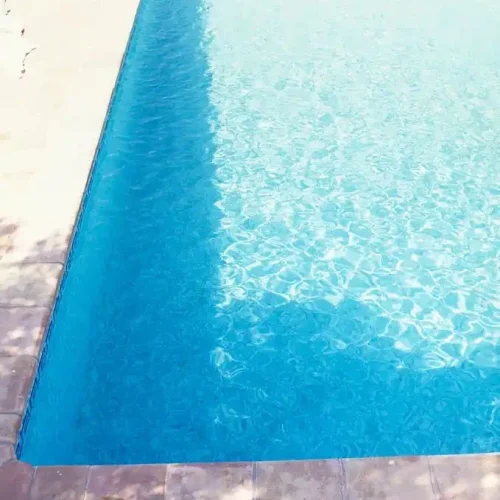 Brian Aris - George Michael by Sparkling Swimming Pool, St Tropez 1988